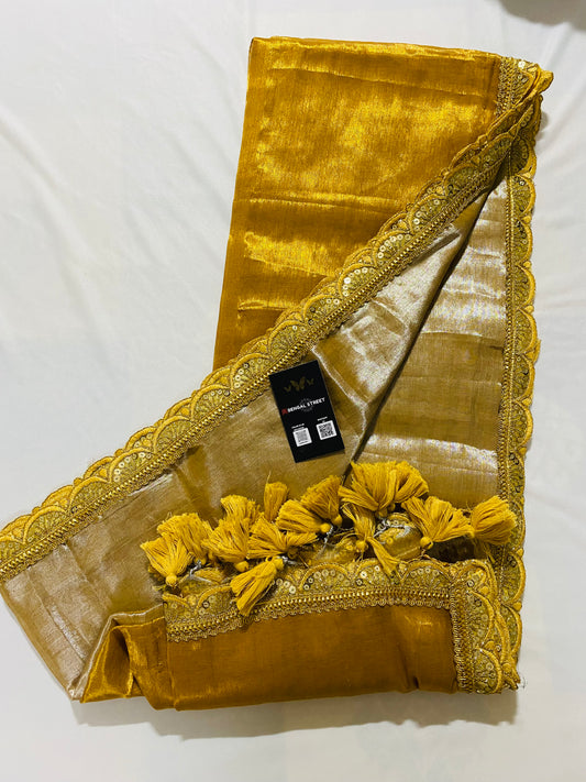 Sajja: Raga Tissue Saree with lace & tassles (dual tone gold)