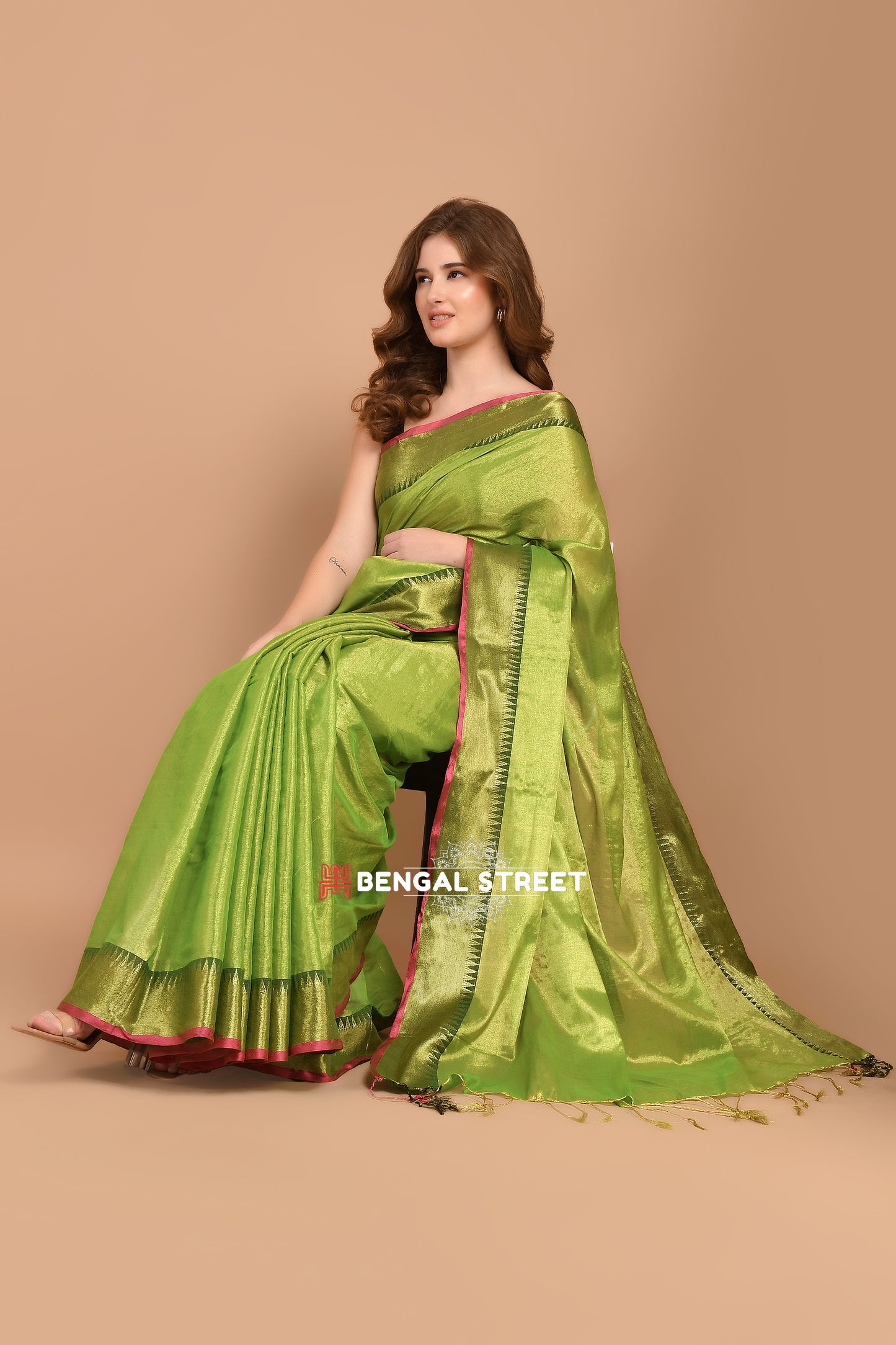 Raga Tissue Temple woven border saree - Green